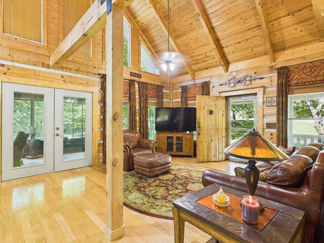 1150 Pin Hook Rd, Spring City, TN 37381 - living room featuring wooden walls, a wooden ceiling with exposed beams, french doors, high vaulted ceiling, and wood finished floors