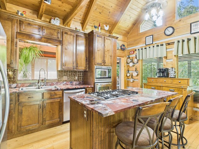 1150 Pin Hook Rd, Spring City, TN 37381 - kitchen featuring appliances with stainless steel finishes, a wood ceiling with exposed beams, light wood-type flooring, wood counters, and a center island