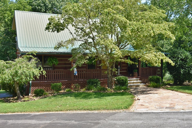 1150 Pin Hook Rd, Spring City, TN 37381 - view of front of house featuring covered porch, a metal roof, and a front yard
