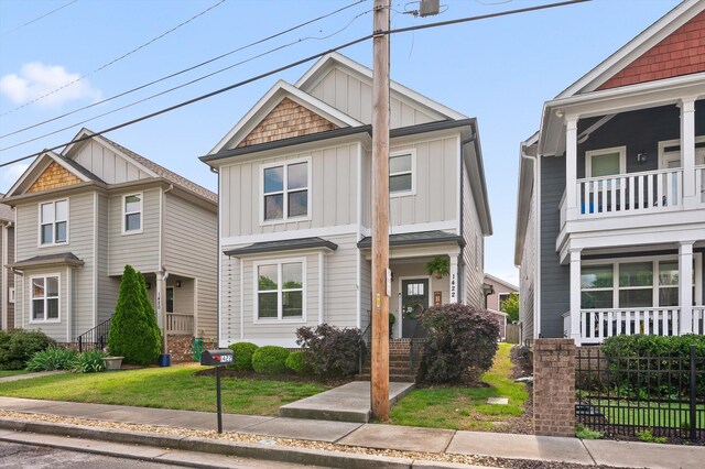 1422 Adams St, Chattanooga, TN 37408 - view of front of home featuring board and batten siding