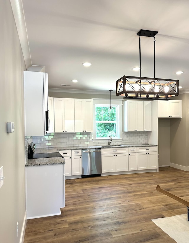 110 Dakota Dr NE, Cleveland, TN 37323 - kitchen featuring appliances with stainless steel finishes, baseboards, white cabinets, tasteful backsplash, and a sink