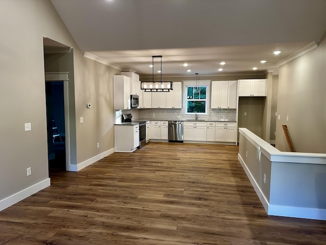 110 Dakota Dr NE, Cleveland, TN 37323 - kitchen featuring stainless steel appliances, ornamental molding, backsplash, white cabinetry, and baseboards