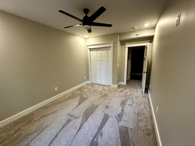 110 Dakota Dr NE, Cleveland, TN 37323 - unfurnished bedroom featuring light colored carpet, baseboards, a ceiling fan, and a closet