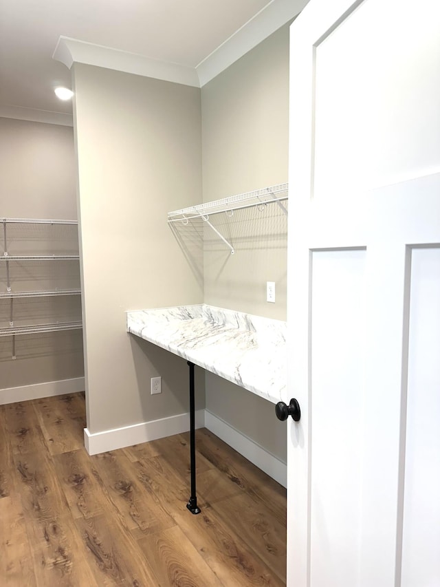 110 Dakota Dr NE, Cleveland, TN 37323 - laundry room with wood finished floors, crown molding, and baseboards