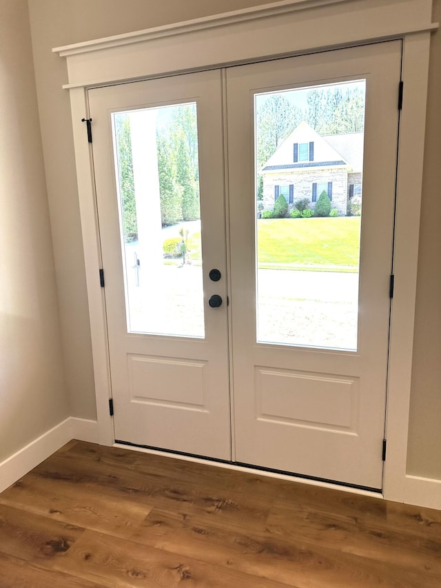 110 Dakota Dr NE, Cleveland, TN 37323 - doorway to outside with plenty of natural light, wood finished floors, and baseboards