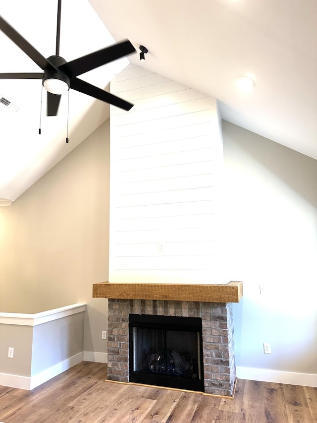110 Dakota Dr NE, Cleveland, TN 37323 - detailed view of a ceiling fan, a fireplace, wood finished floors, and baseboards