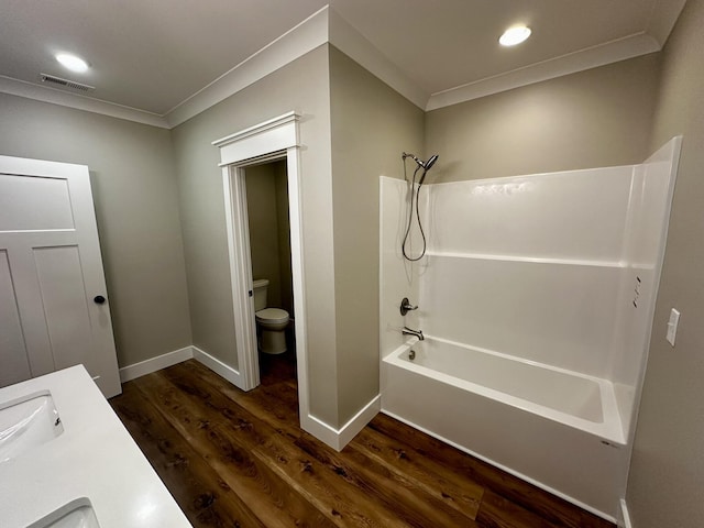 110 Dakota Dr NE, Cleveland, TN 37323 - bathroom with wood finished floors, toilet,  shower combination, ornamental molding, and baseboards