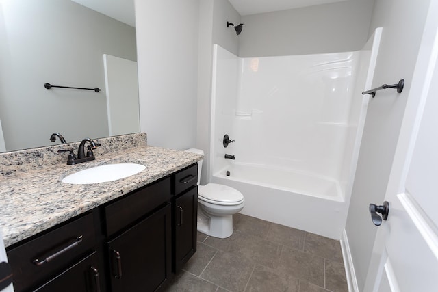 full bathroom featuring tile patterned flooring, shower / washtub combination, vanity, and toilet