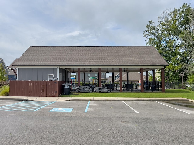 view of parking / parking lot featuring ceiling fan