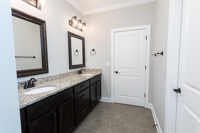 bathroom featuring vanity, tile patterned floors, and ornamental molding