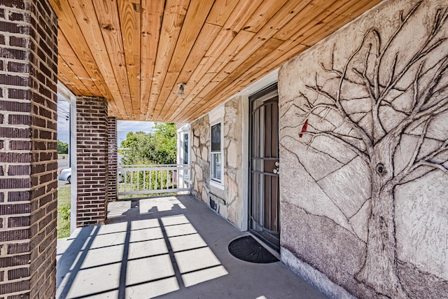 view of patio featuring a porch