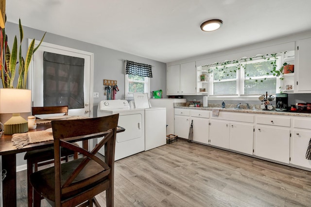 315 Gilliland Rd SE, Cleveland, TN 37311 - kitchen featuring open shelves, independent washer and dryer, and white cabinets