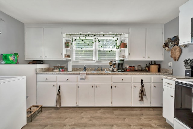 315 Gilliland Rd SE, Cleveland, TN 37311 - kitchen featuring open shelves, white cabinetry, light wood finished floors, and range with electric stovetop