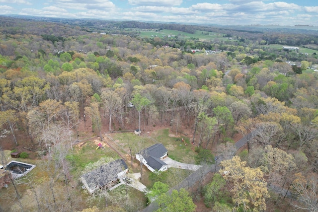 drone / aerial view with a view of trees