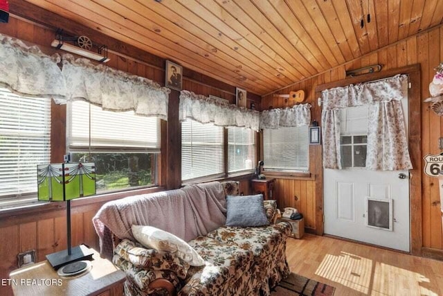 sunroom / solarium with vaulted ceiling and wooden ceiling