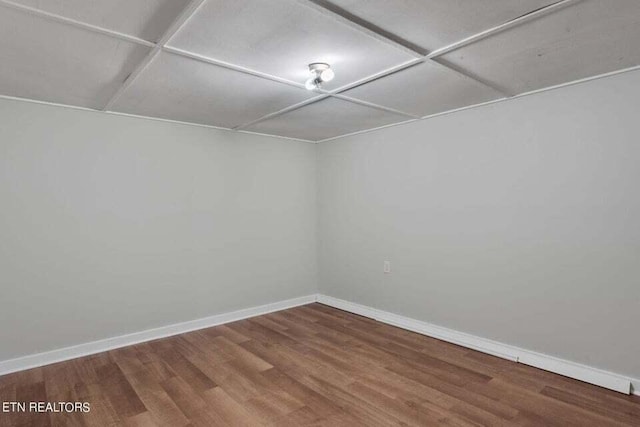 unfurnished room featuring hardwood / wood-style floors