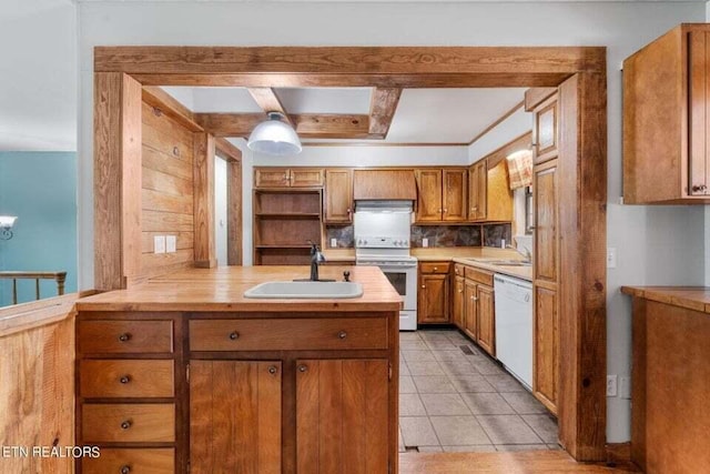 kitchen featuring sink, light tile patterned floors, kitchen peninsula, white appliances, and exhaust hood