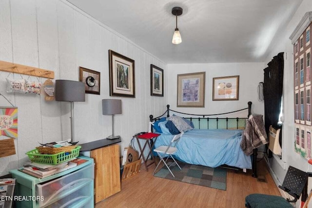 bedroom featuring hardwood / wood-style flooring