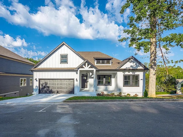 2760 Ridge Park Dr NE Lot 24, Cleveland, TN 37311 - view of front of property with board and batten siding and concrete driveway