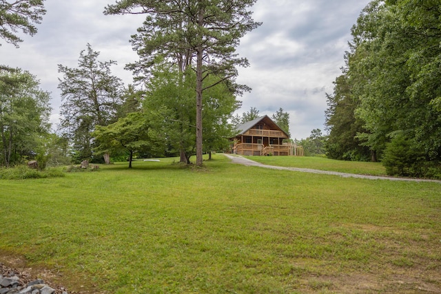 11249 Possum Trail Rd, Harrison, TN 37341 - view of green lawn with a wooden deck