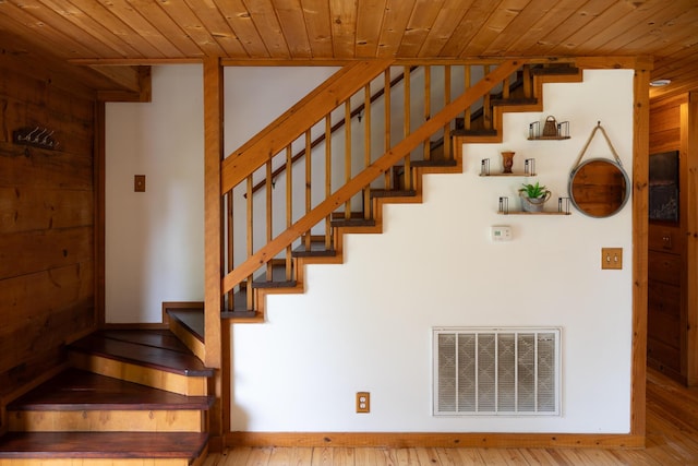 11249 Possum Trail Rd, Harrison, TN 37341 - staircase with wood ceiling, hardwood / wood-style flooring, and baseboards