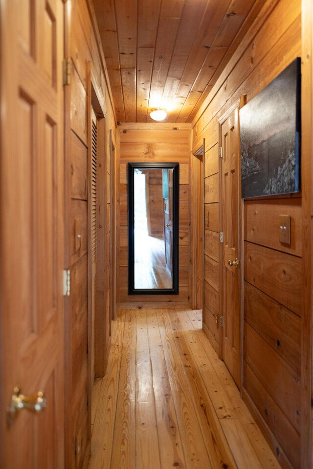 11249 Possum Trail Rd, Harrison, TN 37341 - hall with wood walls, wood ceiling, and light wood finished floors