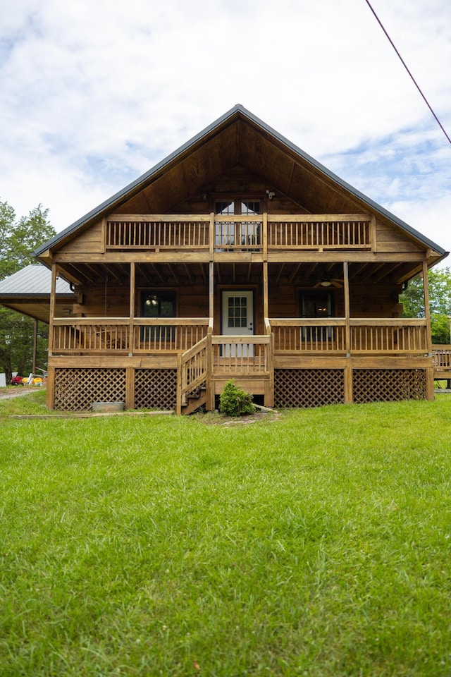 11249 Possum Trail Rd, Harrison, TN 37341 - rear view of house with a yard and a deck
