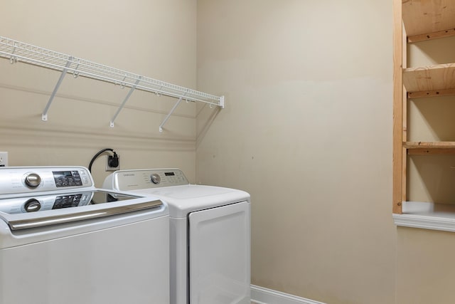 laundry room with washer and clothes dryer