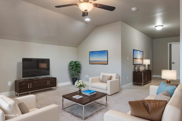 carpeted living room with lofted ceiling and ceiling fan