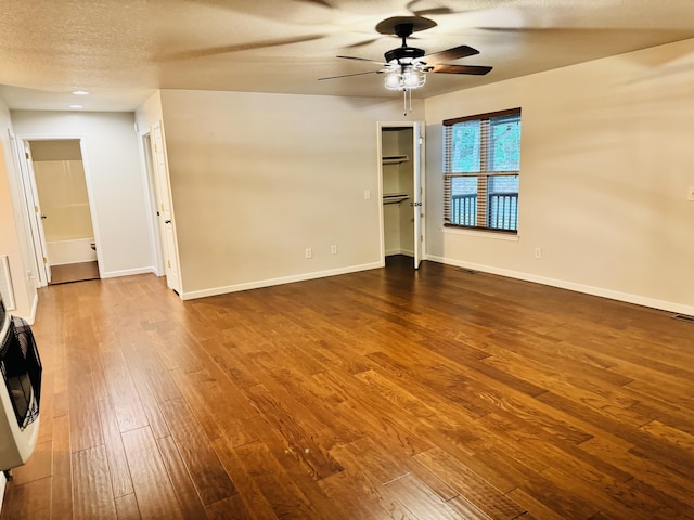 140 Croft Chapel Rd, Turtletown, TN 37391 - empty room with a ceiling fan, hardwood / wood-style floors, baseboards, and a textured ceiling