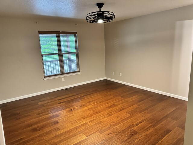 140 Croft Chapel Rd, Turtletown, TN 37391 - spare room with ceiling fan, dark wood finished floors, and baseboards
