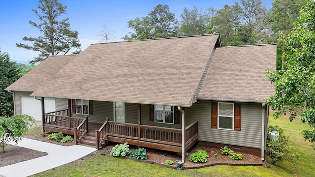 140 Croft Chapel Rd, Turtletown, TN 37391 - cape cod-style house featuring a garage, covered porch, and a shingled roof