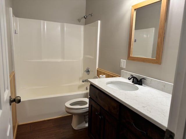 140 Croft Chapel Rd, Turtletown, TN 37391 - full bathroom with toilet, wood finished floors, vanity, and shower / washtub combination