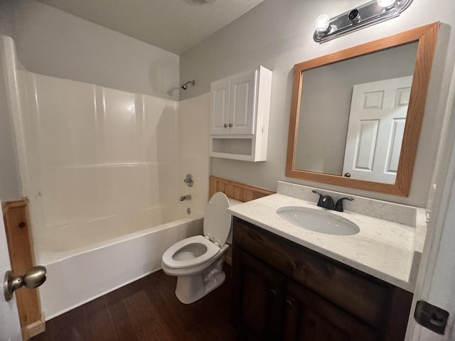 140 Croft Chapel Rd, Turtletown, TN 37391 - full bathroom featuring toilet, wood finished floors, vanity, and tub / shower combination