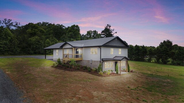 2517 No Pone Rd NW, Georgetown, TN 37336 - view of front of property featuring driveway, a front yard, a metal roof, and a garage