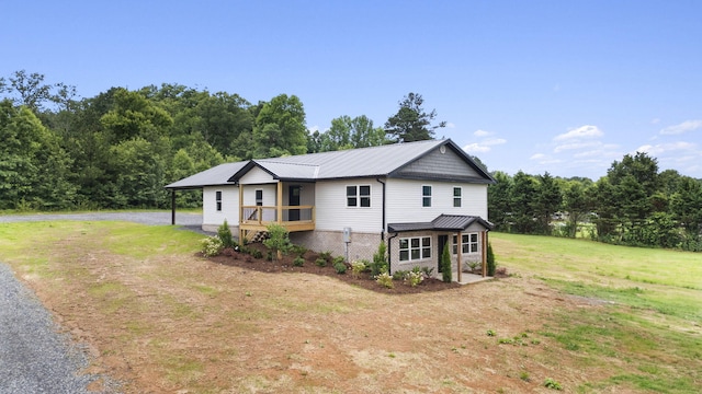 2517 No Pone Rd NW, Georgetown, TN 37336 - view of front of home with a front yard, a metal roof, and asphalt driveway