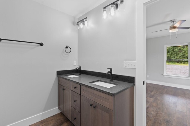 2517 No Pone Rd NW, Georgetown, TN 37336 - bathroom with ceiling fan, wood finished floors, and double vanity