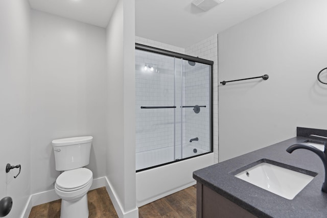 2517 No Pone Rd NW, Georgetown, TN 37336 - bathroom featuring wood finished floors, enclosed tub / shower combo, and vanity
