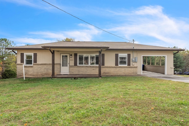 single story home with a front yard and a carport