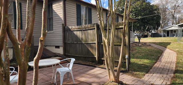 view of patio / terrace with fence