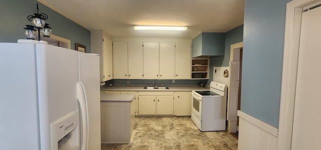 kitchen with stone finish floor, a sink, open shelves, white appliances, and light countertops