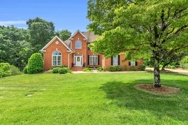 1028 Ivy Manor Ct, Hixson, TN 37343 - view of front of house featuring brick siding and a front yard