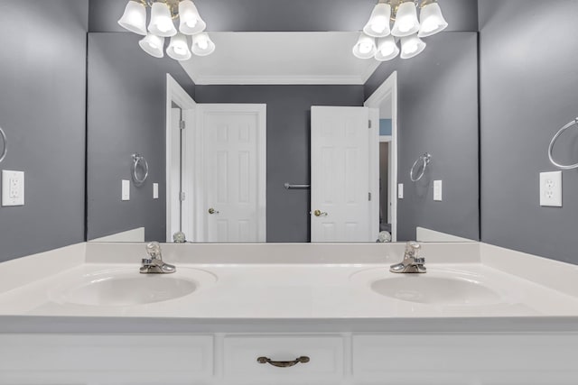 1028 Ivy Manor Ct, Hixson, TN 37343 - bathroom featuring a chandelier and double vanity