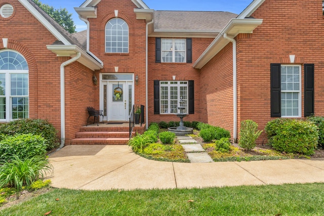 1028 Ivy Manor Ct, Hixson, TN 37343 - entrance to property with brick siding and roof with shingles