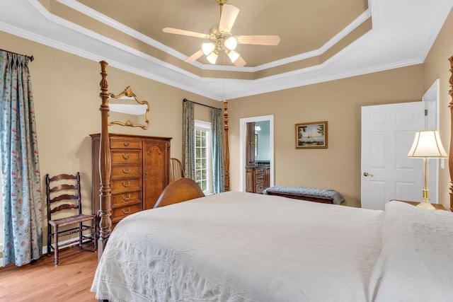 1028 Ivy Manor Ct, Hixson, TN 37343 - bedroom with a raised ceiling, light wood-type flooring, ornamental molding, and a ceiling fan