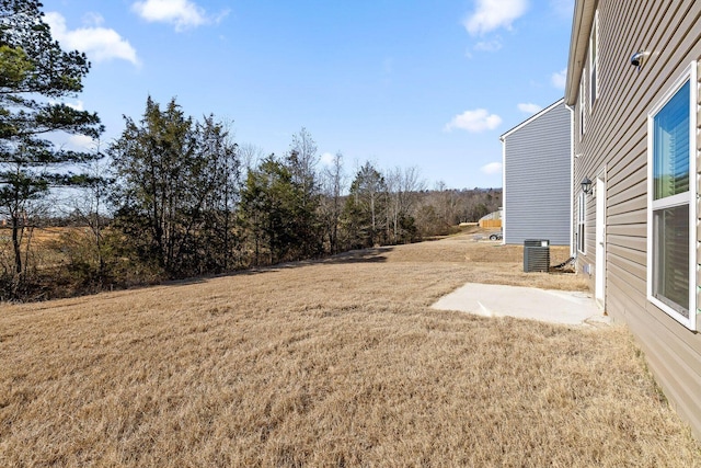 view of yard featuring central AC unit