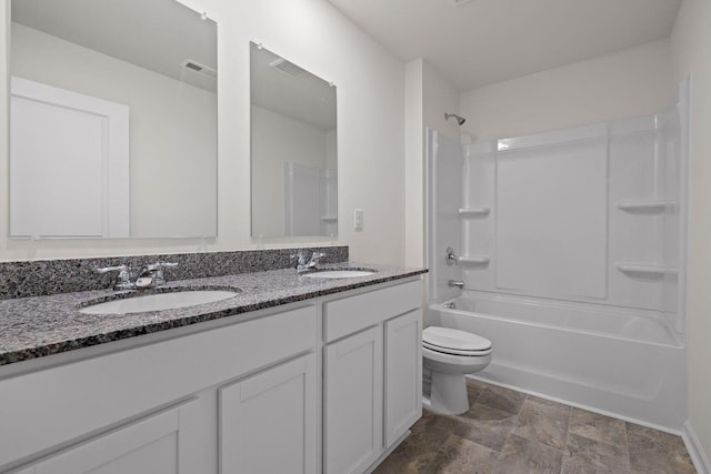 bathroom with visible vents, a sink, toilet, and double vanity