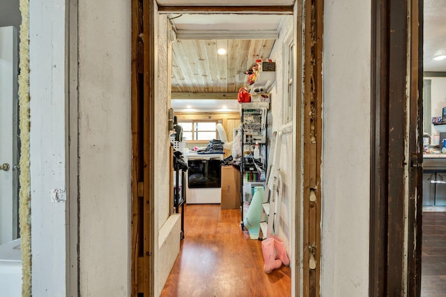 hall with wood ceiling and hardwood / wood-style flooring