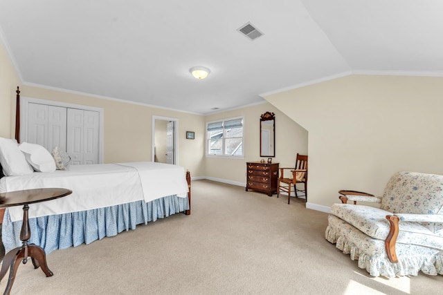 bedroom featuring light carpet, visible vents, lofted ceiling, and ornamental molding