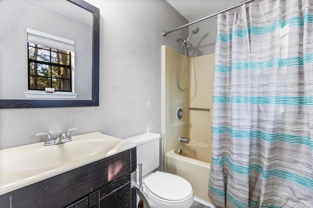 bathroom featuring toilet, vanity, and shower / tub combo with curtain